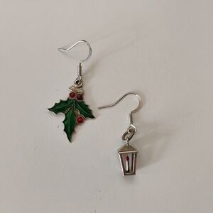 mismatched holiday charm earrings.